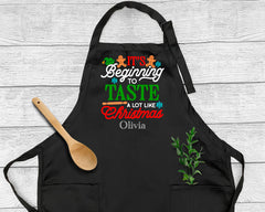 It's Beginning To Taste A Lot Like Christmas Apron